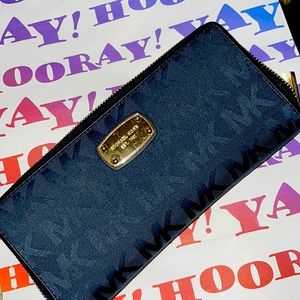 Michael lots full size wallet about 5” inch in size length wise dark navy mk